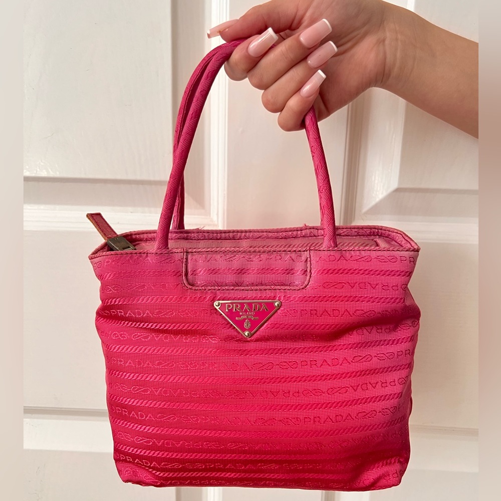 Pink mini Prada hang bag